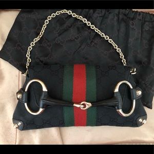 Gucci Horsebit clutch purse monogram.